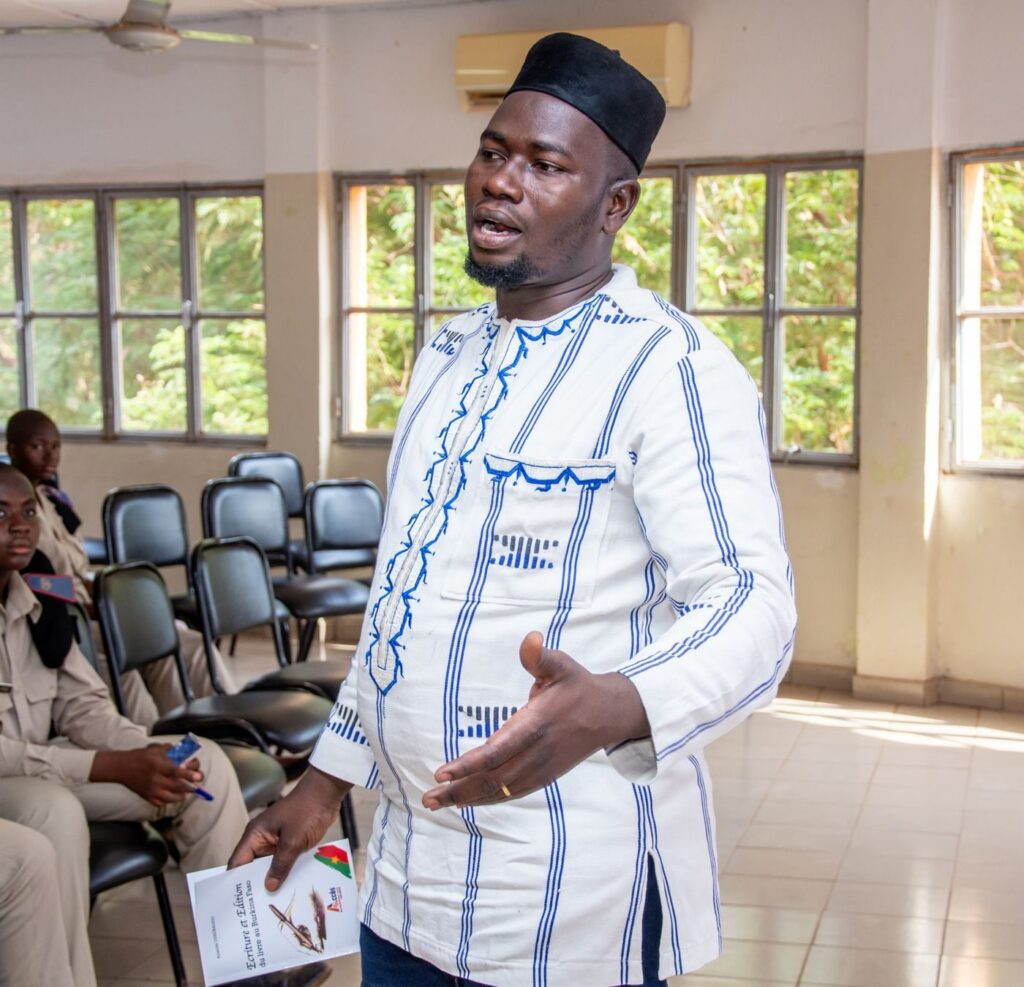 Man addressing a group in a training room